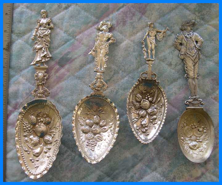 figural berry spoons