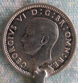 british 3 pence coin spoon