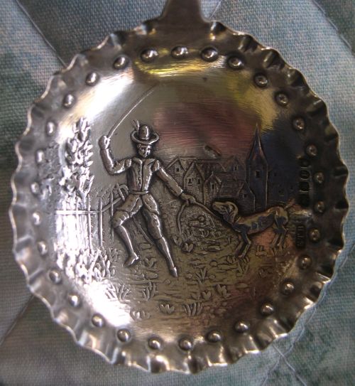 man and dog spoon