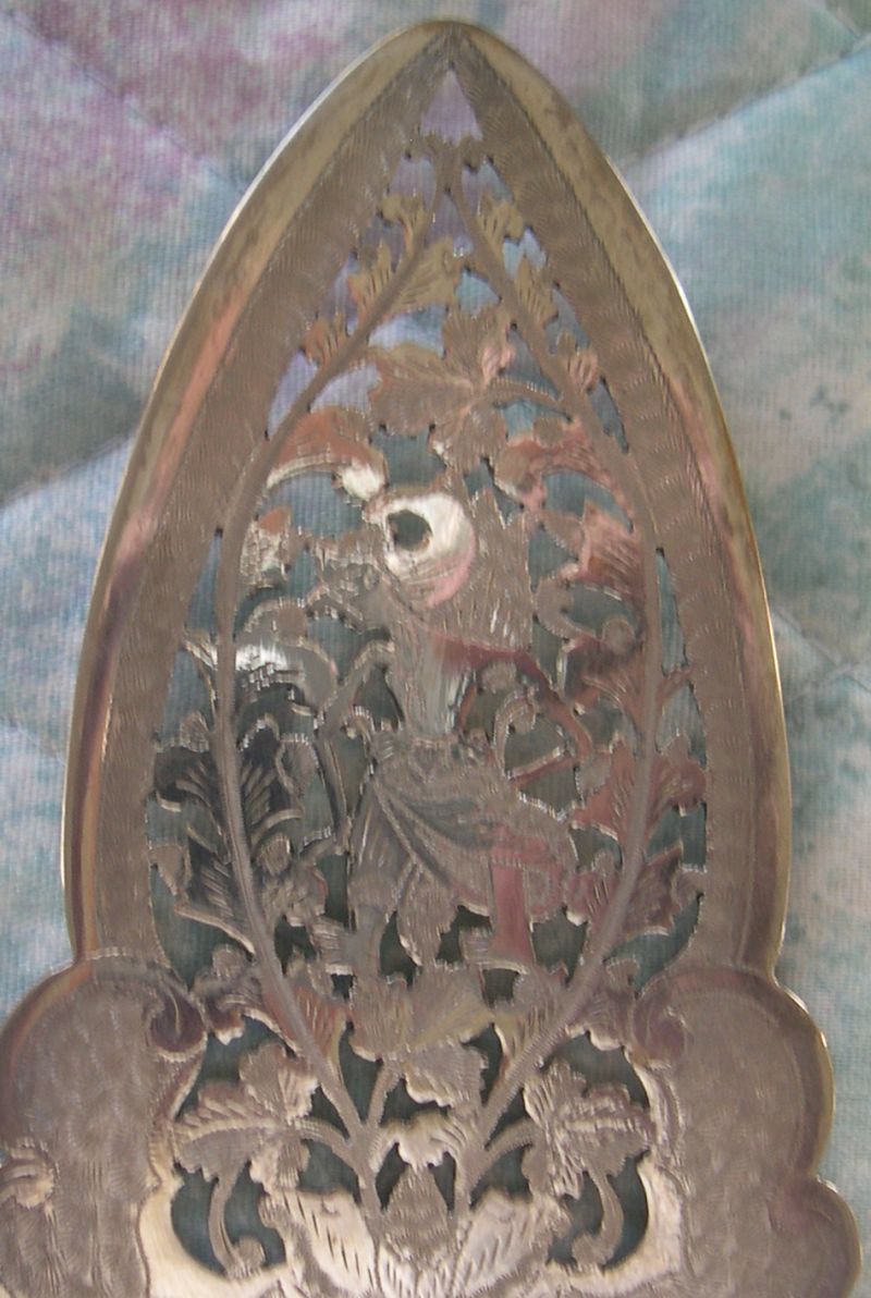 indonesia silver wayang puppet slice
